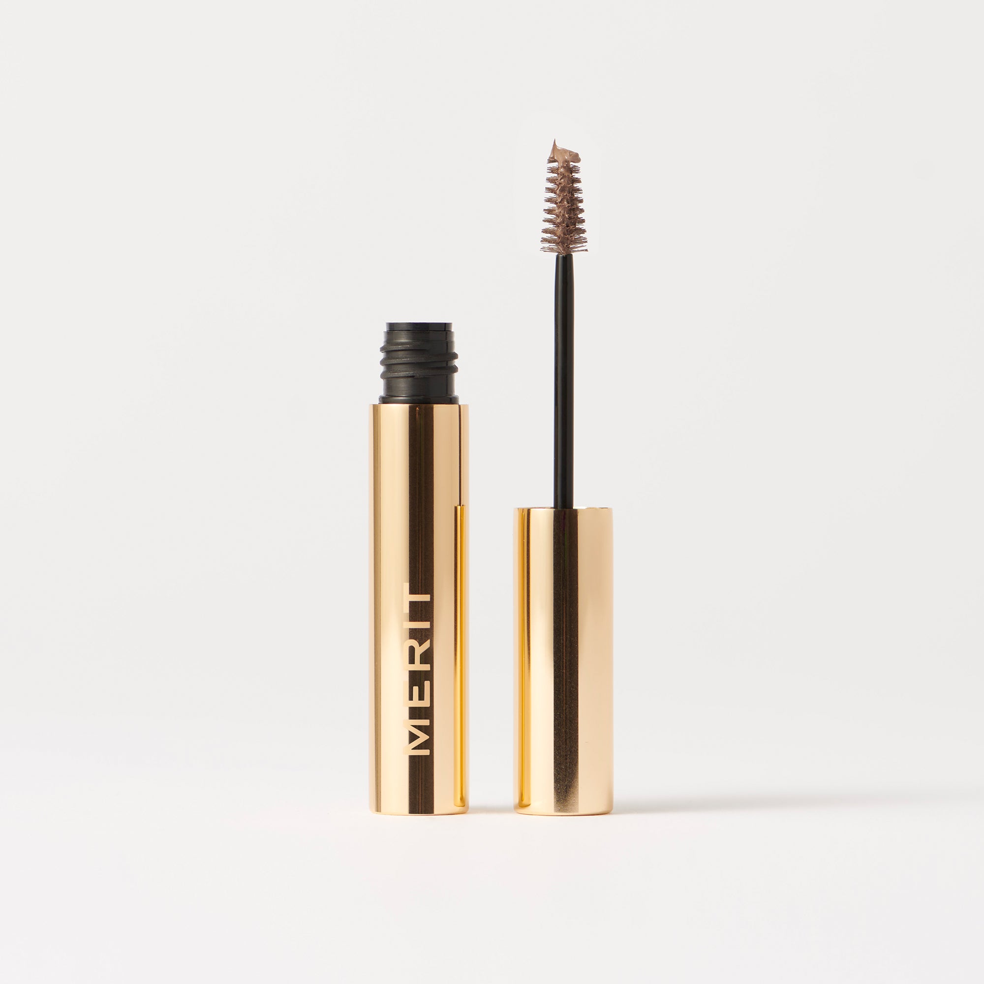 Master || Brow pomade with gold packaging on a white background