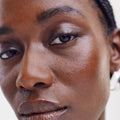 Brown Black | face | Model is wearing Brow 1980 and Brow 1990 in Brown Black