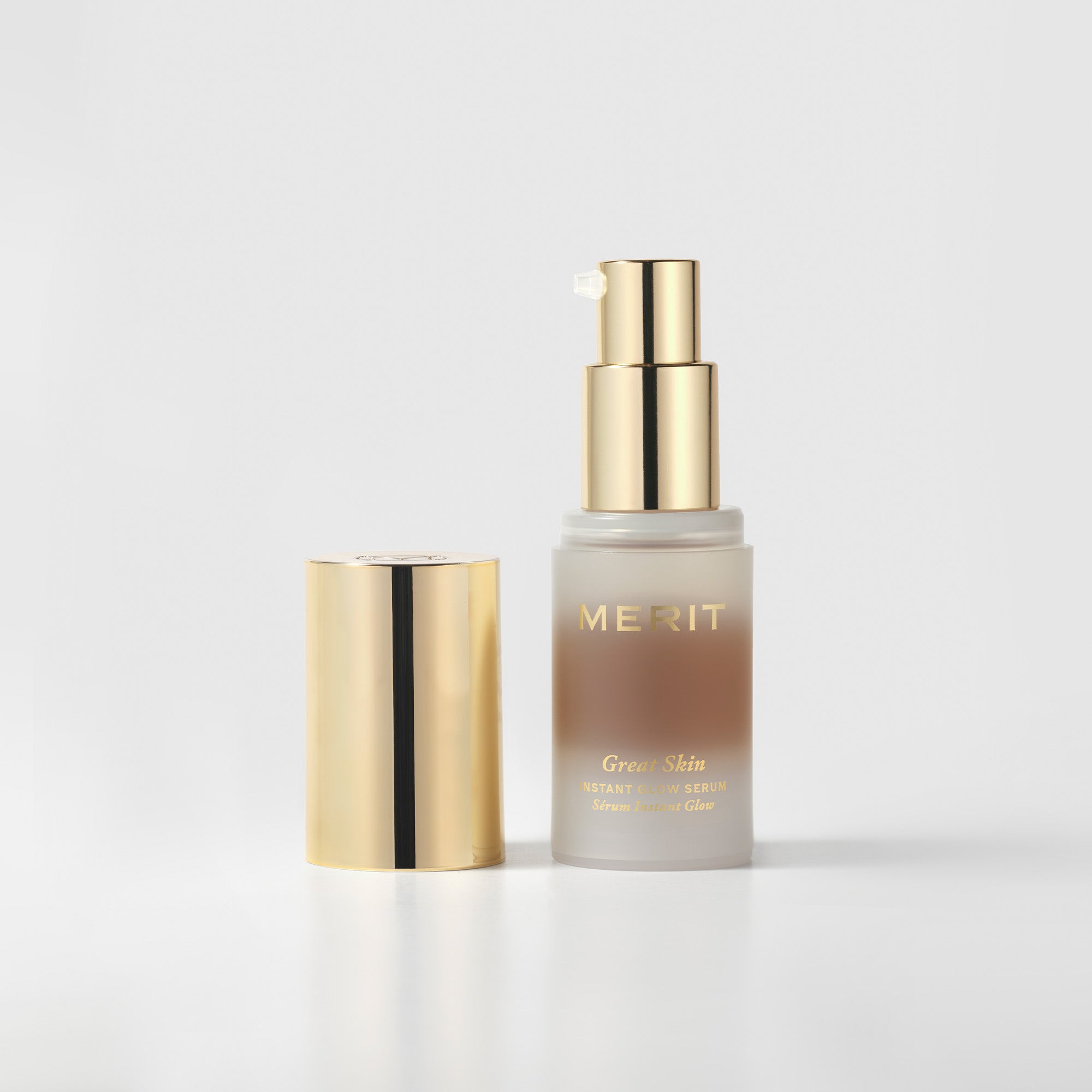 Master | | Travel-Sized bottle of Great Skin Instant Glow Serum against a white background.