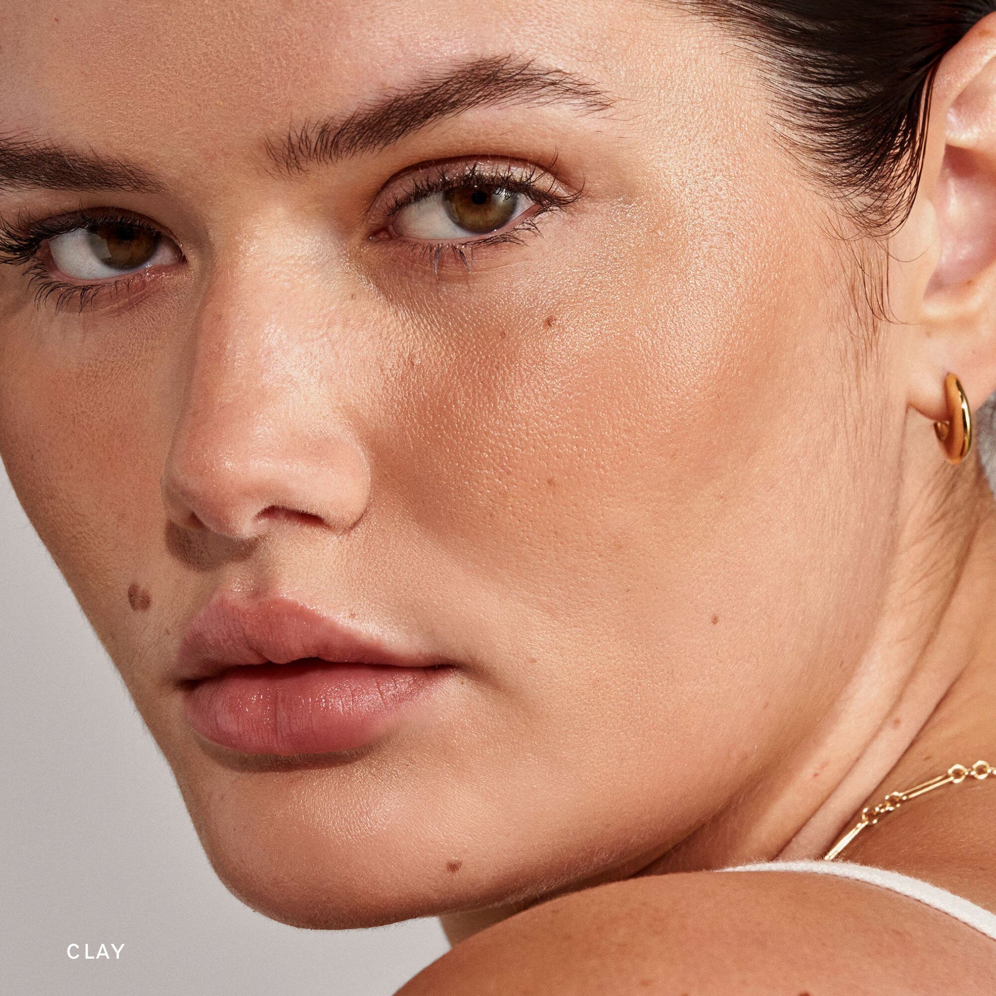 Master || Image of Clay Bronze Balm on Model 