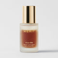 Master || Bottle of Great Skin Instant Glow Serum against a white background.
