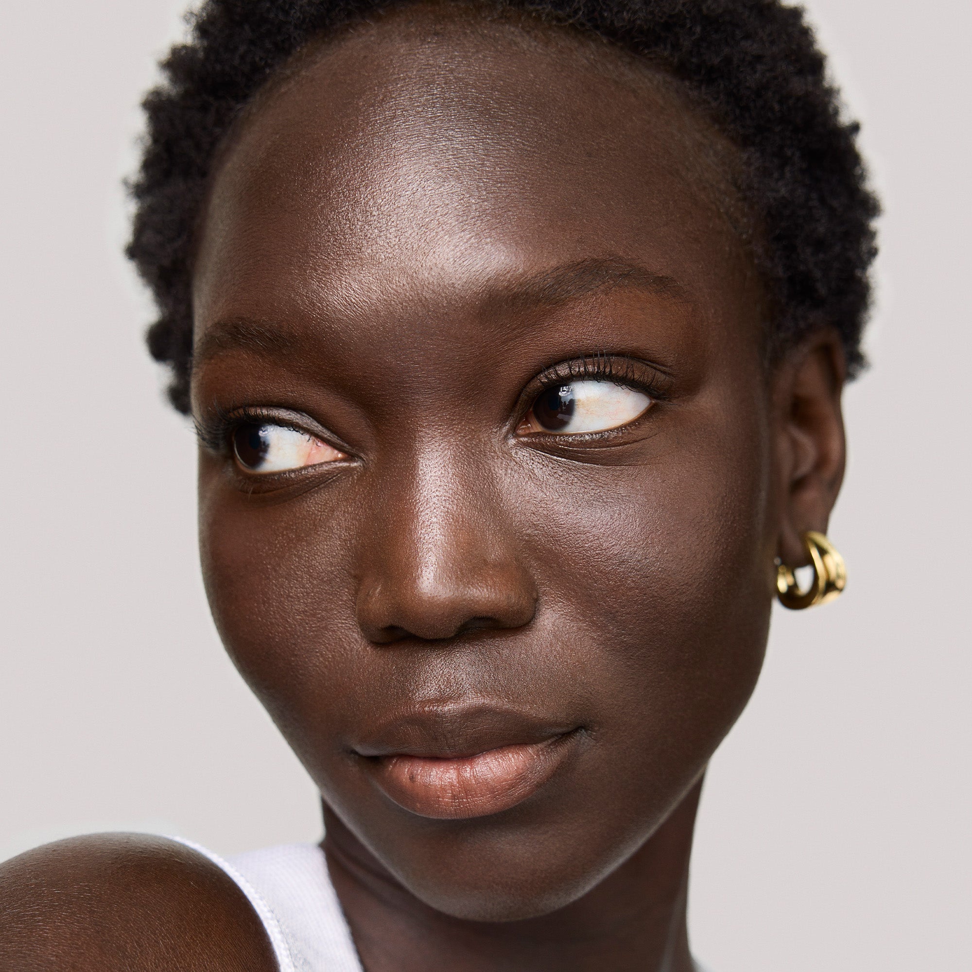 Master || Close-up of a woman's face with wearing the Uniform in Shade 2