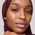 Master || Close-up of a woman's face with wearing the Uniform in Shade 10