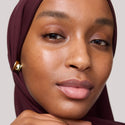 Master || Close-up of a woman's face with wearing the Uniform in Shade 10