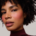 Après | face::deep | Model is wearing Flush Balm in shade Après.