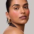 Master || Model is wearing Flush Balm in shade Après.