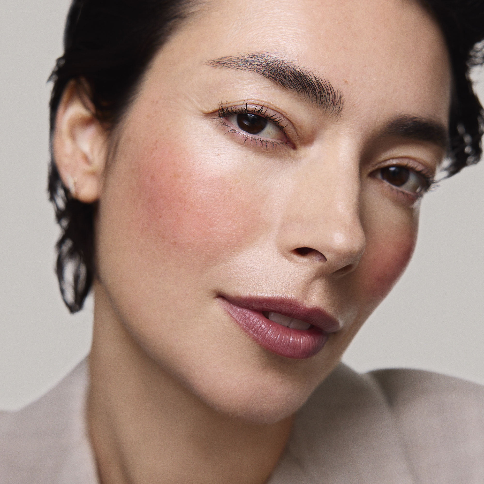 Master ||  Model is wearing Flush Balm in shade Archival.