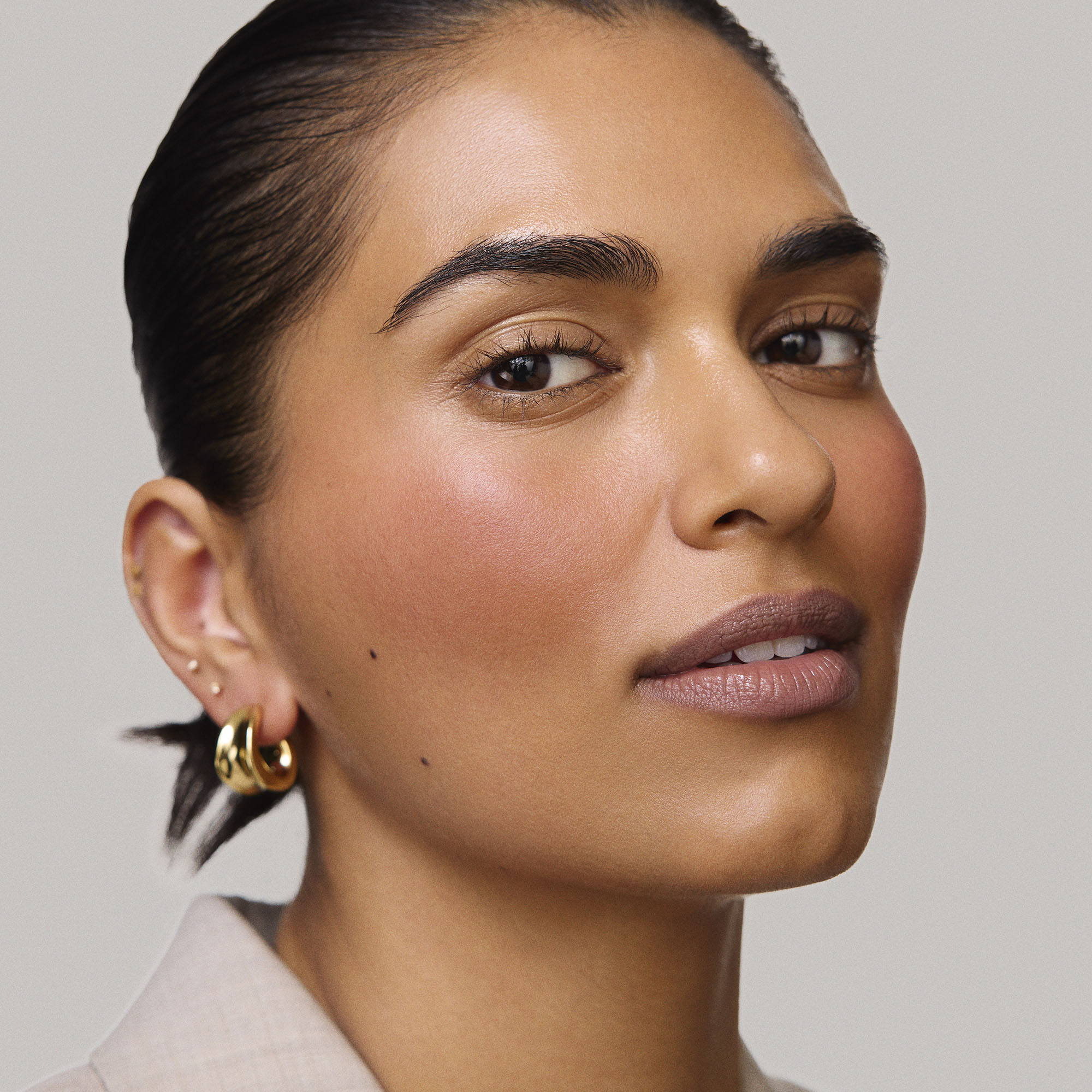 Master || Model is wearing Flush Balm in shade Bespoke.