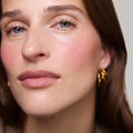 Master || Model is wearing Flush Balm in shade Beverly Hills.