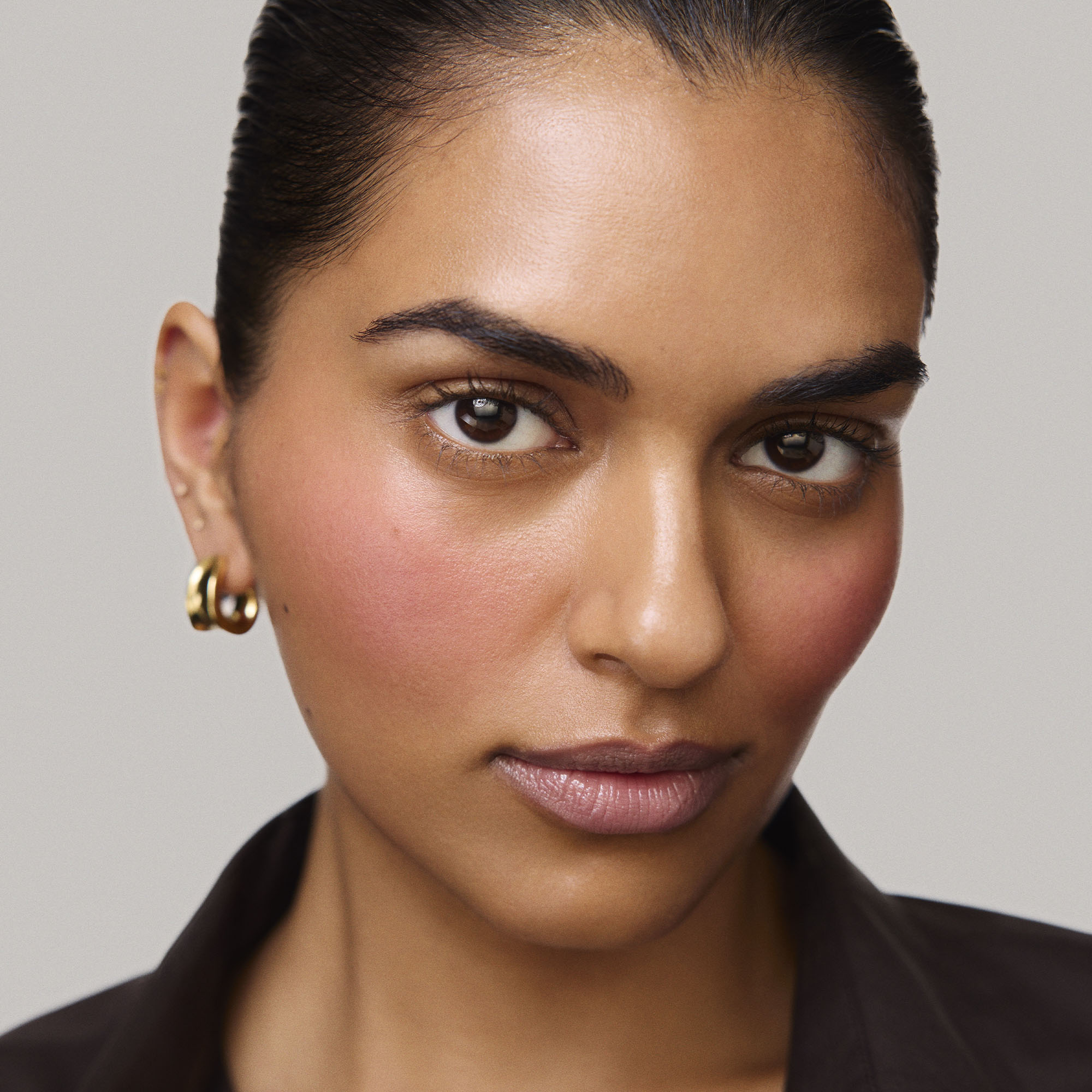 Master || Model is wearing Flush Balm in shade Beverly Hills.