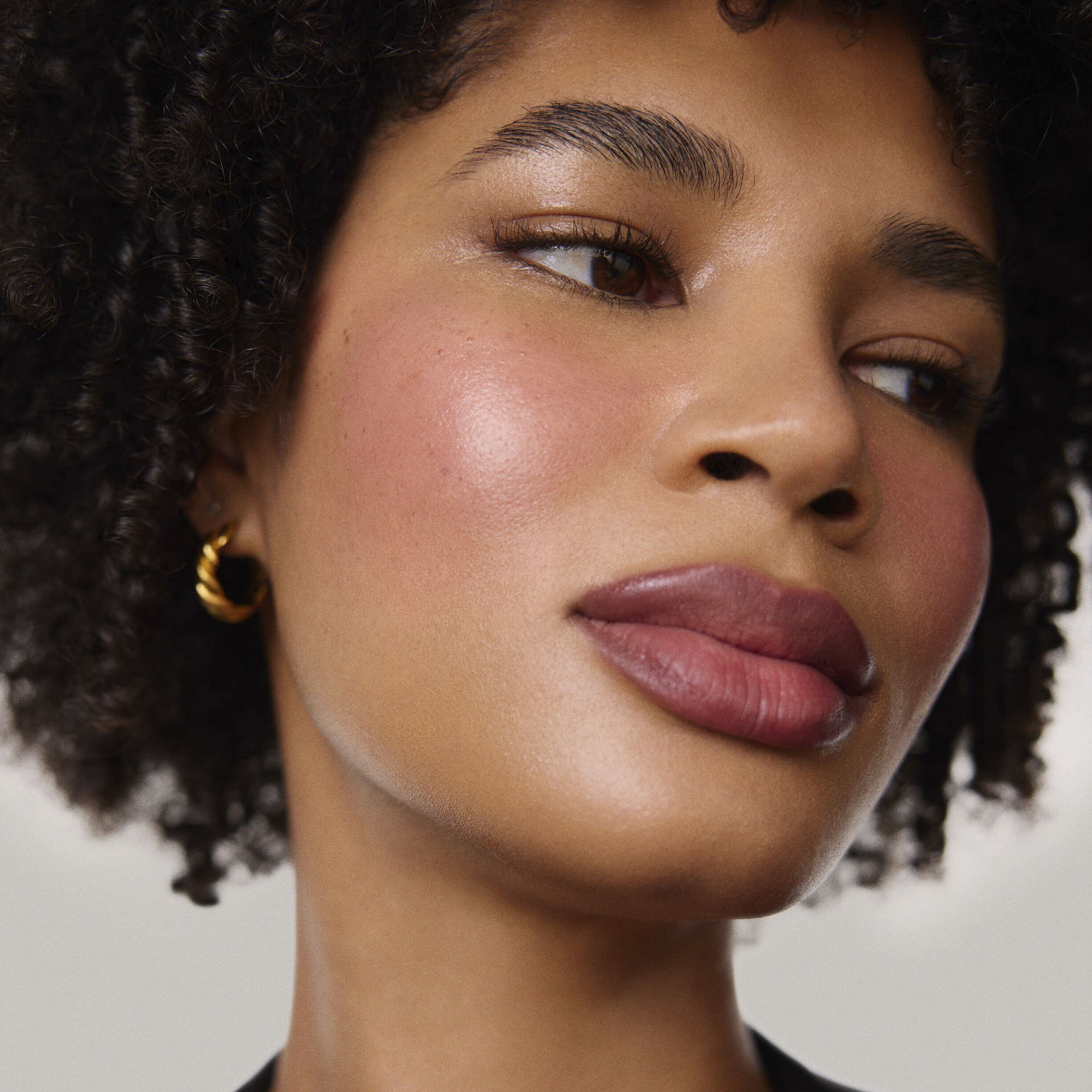 Master || Model is wearing Flush Balm in shade Cheeky.