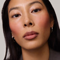 Fox | face::medium | Model is wearing Flush Balm in shade Fox.