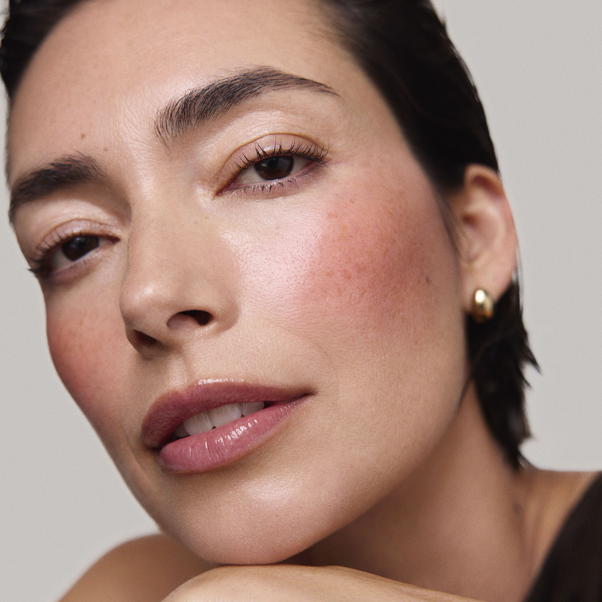 Fox | face::light | Model is wearing Flush Balm in shade Fox.
