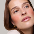Fox | face::fair  |  Model is wearing Flush Balm in shade Fox.