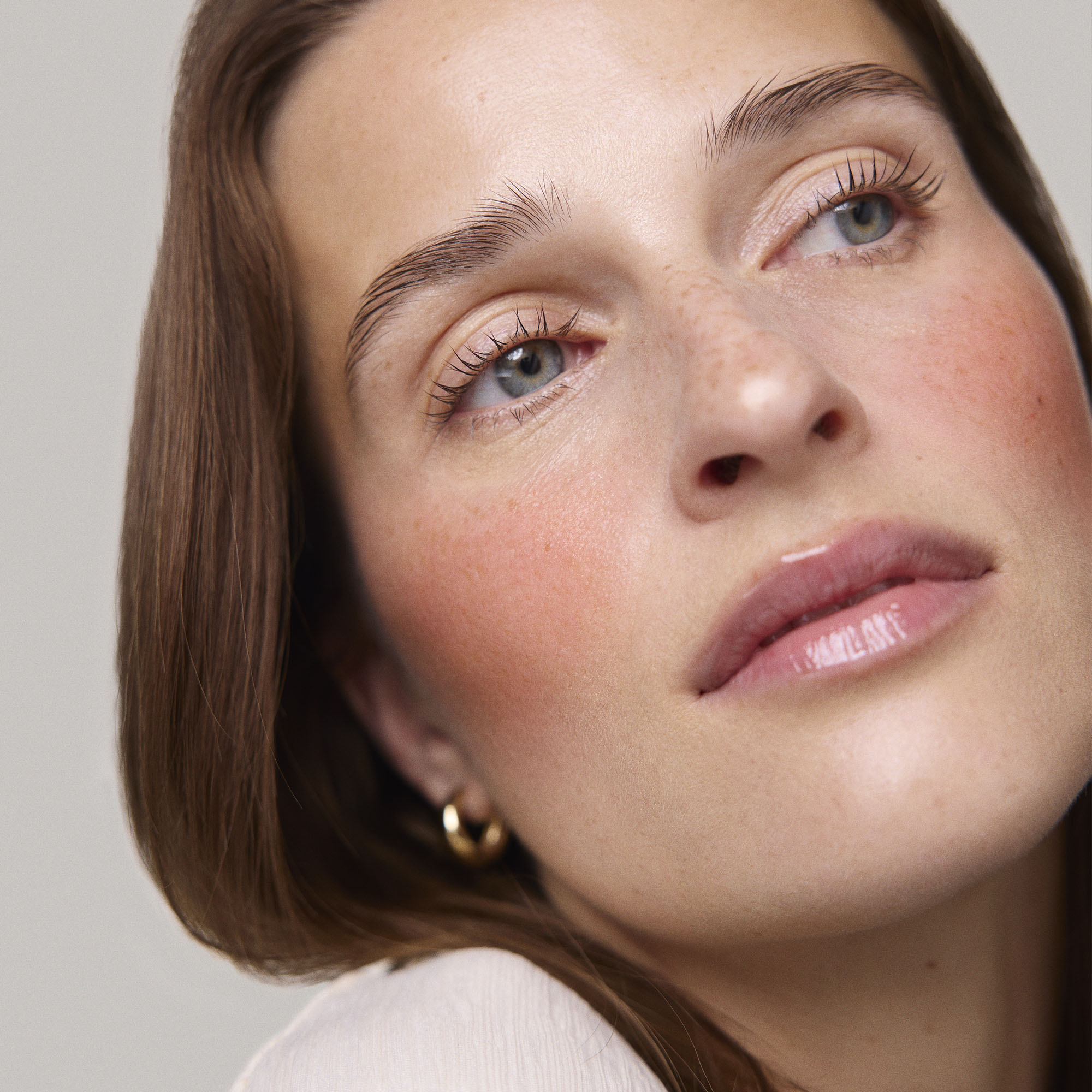 Fox | face::fair  |  Model is wearing Flush Balm in shade Fox.