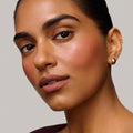 Fox | face::medium | Model is wearing Flush Balm in shade Fox.