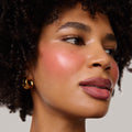 Master || Model is wearing Flush Balm in shade Le Bonbon.