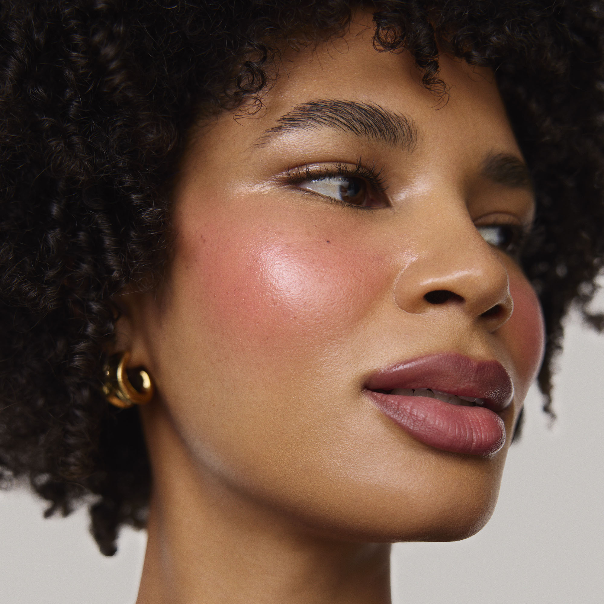 Master || Model is wearing Flush Balm in shade Le Bonbon.