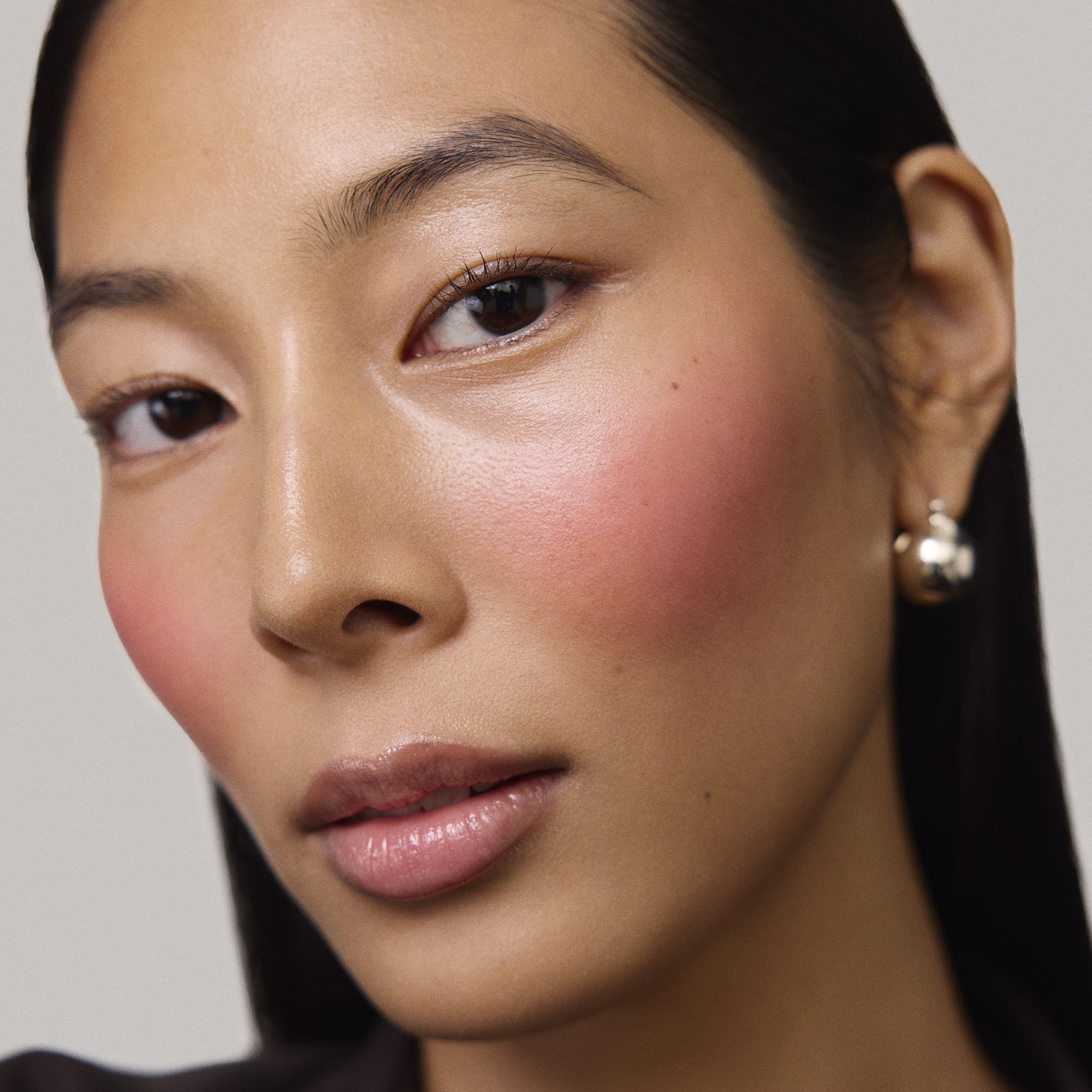 Master || Model is wearing Flush Balm in shade Le Bonbon.