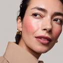 Le Bonbon | face::light | Model is wearing Flush Balm in shade Le Bonbon.