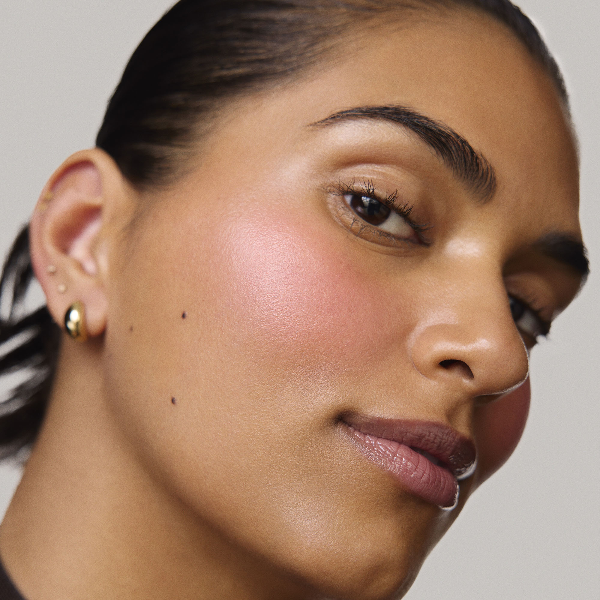 Master || Model is wearing Flush Balm in shade Stockholm.