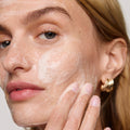 Master || Model is washing her face with great skin double cleanse