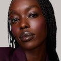 Model wears Shade Slick and Signature Lip Liner
