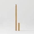 Master || A gold-colored lip liner pencil with its cap removed, displayed against a white background in shade Sportif 