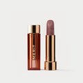 Master ||  A tube of lipstick in shade Bespoke with a gold and brown cap next to its open container.