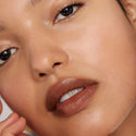1990 | face::medium | Claudia wears Signature Lip in 1990