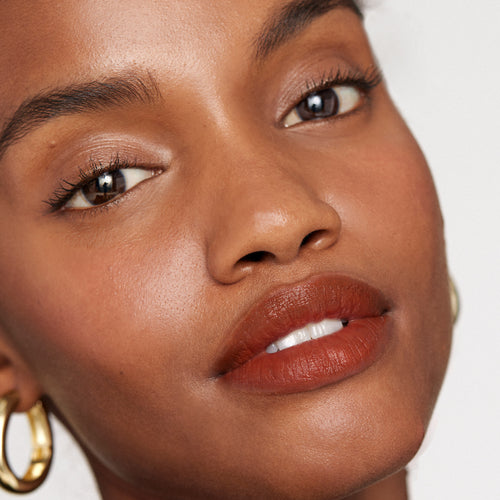 Tiger | face::deep | Farhiya wears Signature Lip in Tiger