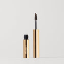 Master || Brow pomade with gold packaging on a white background.