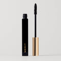 Master || Clean Lash Mascara wand with black mascara is shown alongside a mascara tube.