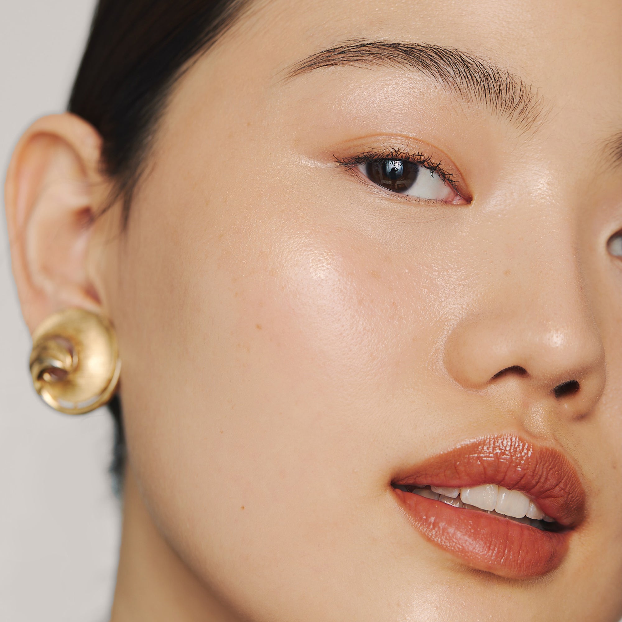 Citrine | face | Model is wearing Day Glow in Citrine